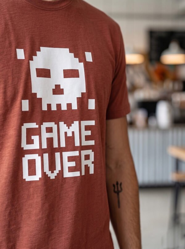 Game Over Pixel Skull Round Neck T-Shirt in Brown, print close-up Game Over Pixel Skull Round Neck T-Shirt in Brown, print close-up