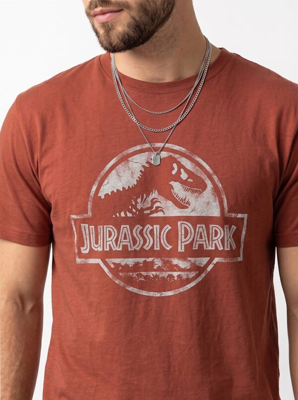 Jurassic Park Distressed Logo Round Neck T-Shirt in Brown, distressed print close-up