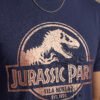 Jurassic Park Distressed Logo Round Neck T-Shirt in Navy Blue, distressed print close-up