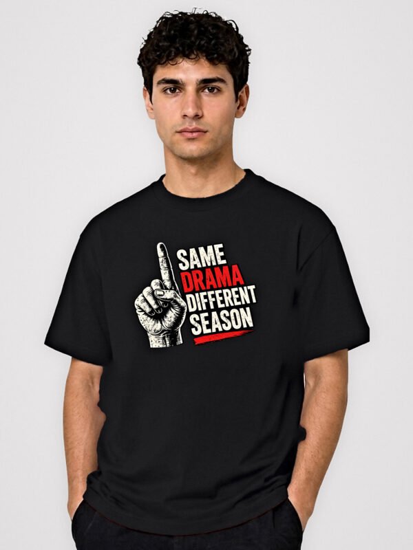 Same Drama Different Season round neck t-shirt in Black – front view with the raised-finger chest print