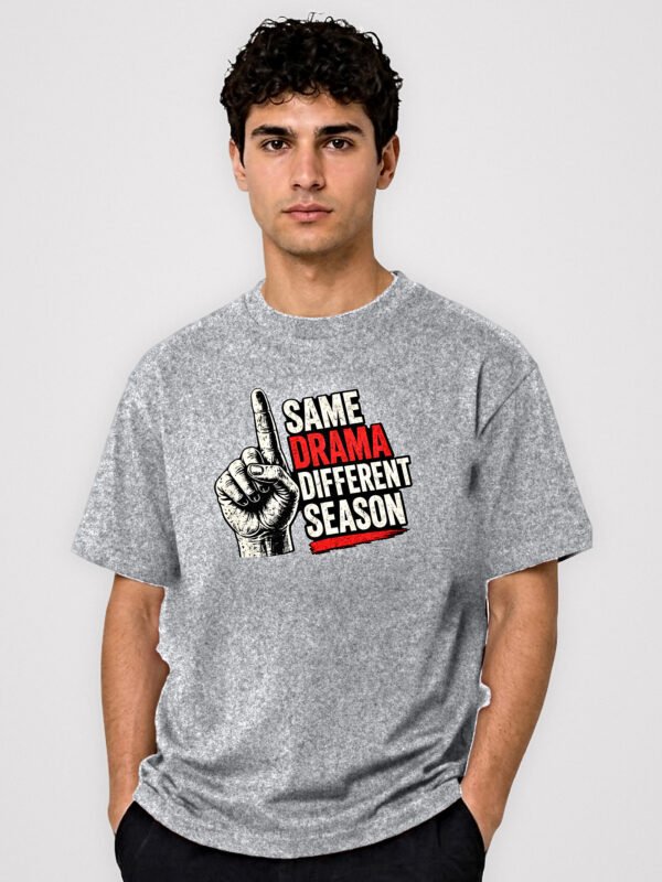 Same Drama Different Season round neck t-shirt in Grey Melange – front view with the raised-finger chest print