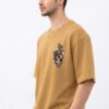 Mustard Sharingan kunai and crows anime oversized t-shirt, three-quarter view