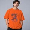 Born To Skate Skateboard Club Retro Round Neck T-Shirt in orange, front view – Kool Kameez