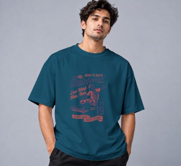 Born To Skate Skateboard Club 240 GSM Oversized Tee in petrol blue, front view – Kool Kameez