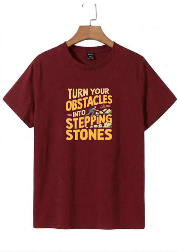 Stepping Stones Quote Round Neck T-Shirt - maroon flat Maroon Turn Your Obstacles Into Stepping Stones quote round neck t-shirt, flat lay view