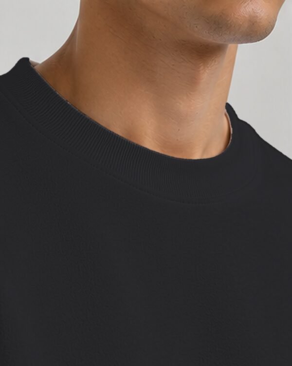 Black heavyweight oversized sweatshirt 400 GSM, collar close-up Black heavyweight oversized sweatshirt 400 GSM, collar close-up