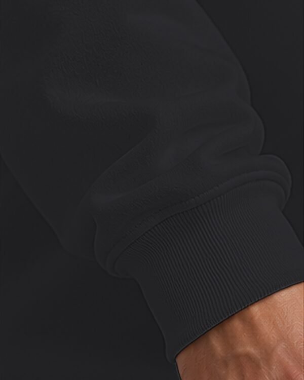 Black heavyweight oversized sweatshirt 400 GSM, ribbed cuff close-up Black heavyweight oversized sweatshirt 400 GSM, ribbed cuff close-up