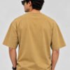 Plain Cotton 220 GSM Oversized Tee – Beige – model back view Plain Cotton 220 GSM Oversized Tee – Beige – model back view