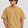 Plain Cotton 220 GSM Oversized Tee – Beige – model front view Plain Cotton 220 GSM Oversized Tee – Beige – model front view