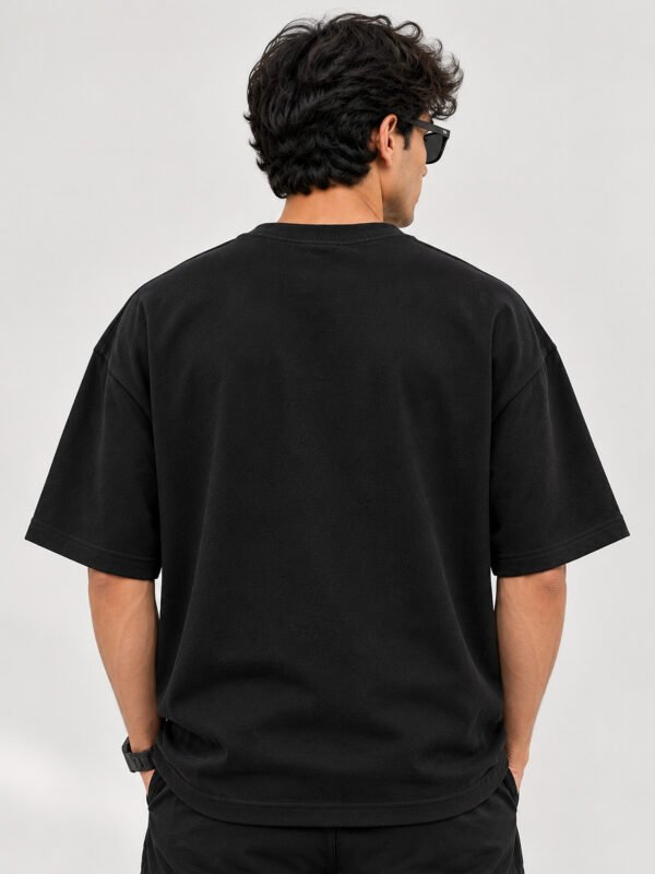 Plain Cotton 220 GSM Oversized Tee – Black – model back view Plain Cotton 220 GSM Oversized Tee – Black – model back view