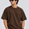 Plain Cotton 220 GSM Oversized Tee – Brown – model front view Plain Cotton 220 GSM Oversized Tee – Brown – model front view