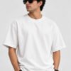 Plain Cotton 220 GSM Oversized Tee – White – model front view Plain Cotton 220 GSM Oversized Tee – White – model front view