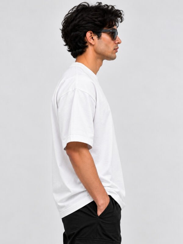 Plain Cotton 220 GSM Oversized Tee – White – model right side view Plain Cotton 220 GSM Oversized Tee – White – model right side view