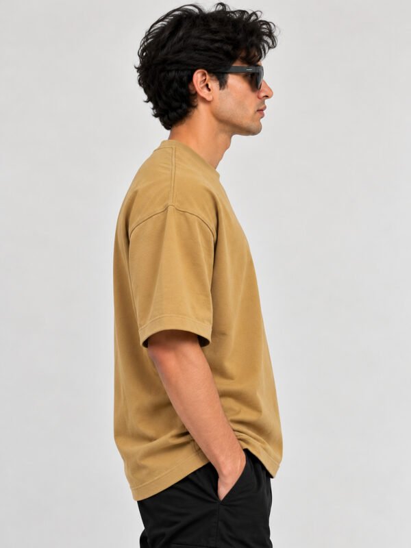 Cotton Terry 240 GSM Oversized Tee – Beige – model right side view Cotton Terry 240 GSM Oversized Tee – Beige – model right side view