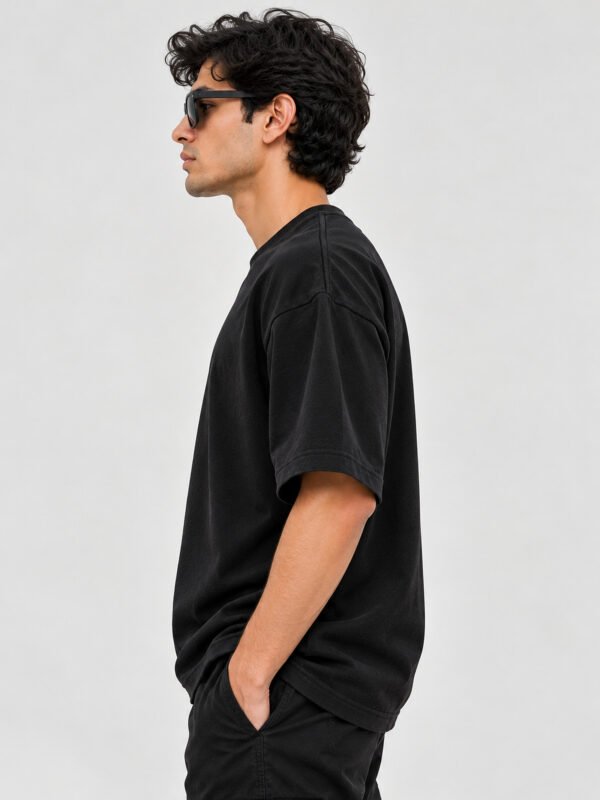 Cotton Terry 240 GSM Oversized Tee – Black – model left side view Cotton Terry 240 GSM Oversized Tee – Black – model left side view