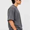 Cotton Terry 240 GSM Oversized Tee – Smokey Grey – model side view Cotton Terry 240 GSM Oversized Tee – Smokey Grey – model side view