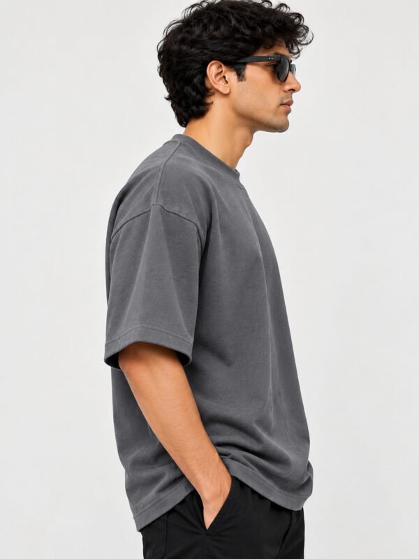 Cotton Terry 240 GSM Oversized Tee – Smokey Grey – model side view Cotton Terry 240 GSM Oversized Tee – Smokey Grey – model side view